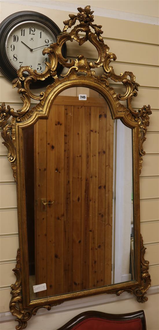 A gilt frame wall mirror, H.125cm